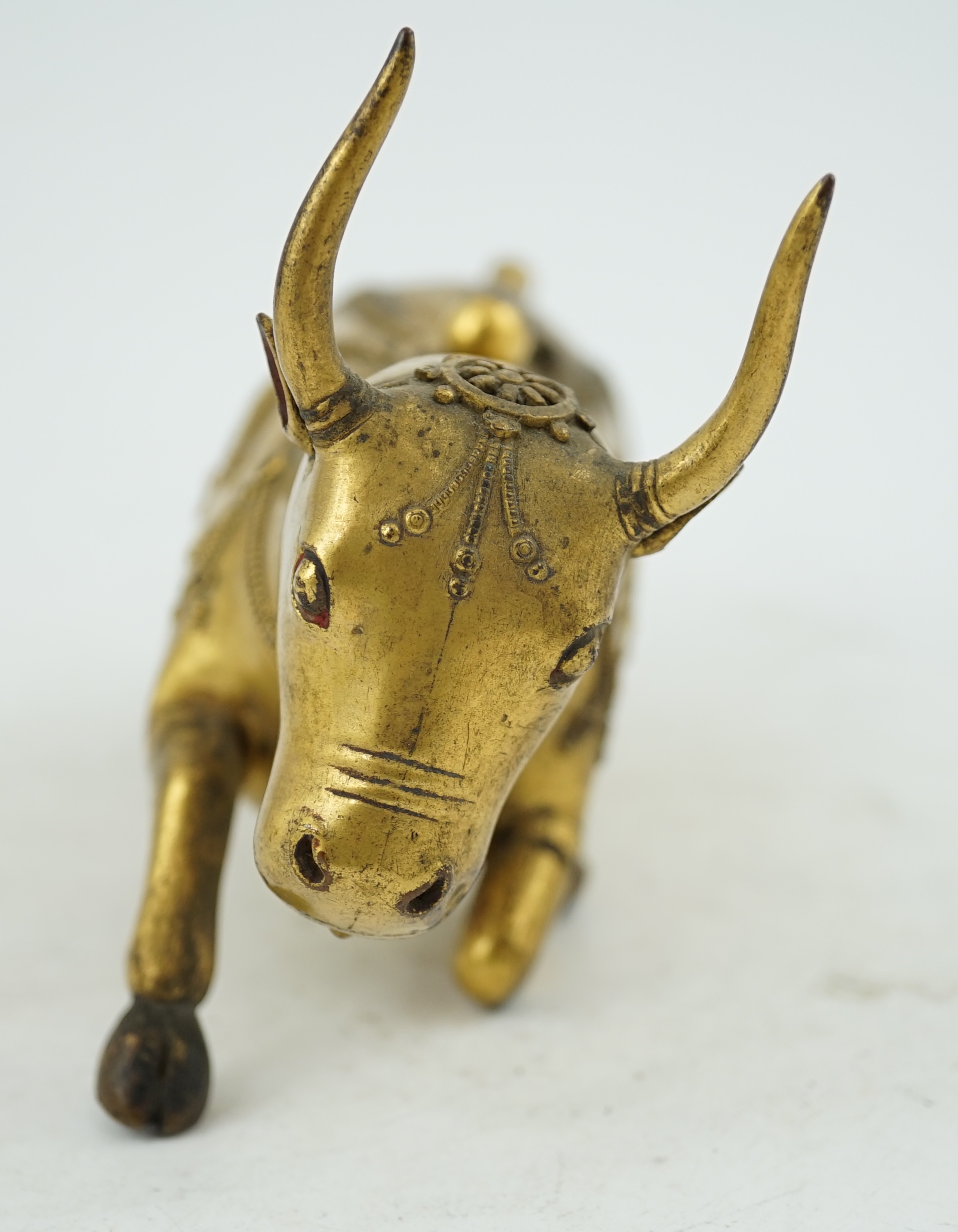 A Tibetan gilt bronze figure of a buffalo, 18th century